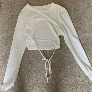 open back, cropped long sleeve. perfect for going out